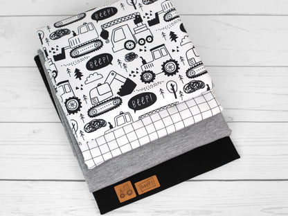 stoff-french-terry-baumwolle-sommersweat-unangeraut-kathi-kunterbunt-baufahrzeuge-schwarz-weiss-kombistoffe