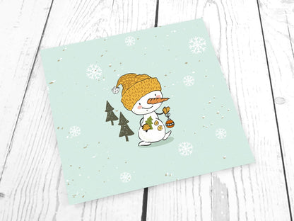 stoff-french-terry-sommersweat-sweat-unangeraut-baumwolle-kathi-kunterbunt-weihnachten-winter-schneemann-tannenbaum-schnee-schneeflocken-mint-panel-schneemann-mit-baumschmuck