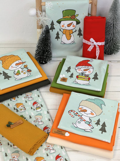 stoff-french-terry-sommersweat-sweat-unangeraut-baumwolle-kathi-kunterbunt-weihnachten-winter-schneemann-tannenbaum-schnee-schneeflocken-mint-serie