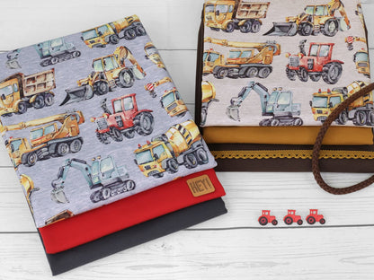 stoff-french-terry-sweat-sommersweat-unangeraut-baufahrzeuge-autos-traktor-bagger-betonmischer-meliert-serie