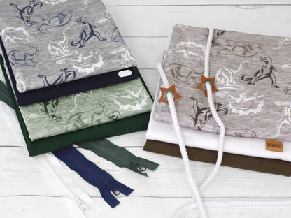 stoff-french-terry-sweat-sommersweat-unangeraut-kathi-kunterbunt-dino-dinosaurier-meliert-serie