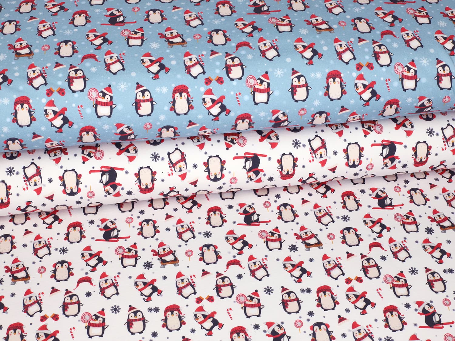 stoff-french-terry-sweat-unangeraut-sommersweat-winter-weihnachten-tiere-pinguin-schlitten-schal-muetze-serie