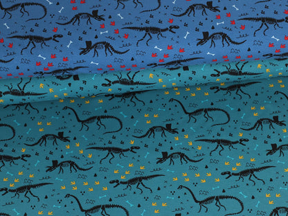 stoff-jersey-baumwolle-baumwolljersey-dino-dinosaurier-skelett-spuren-knochen-hellpetrol-blau-serie