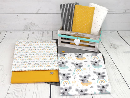 stoff-jersey-baumwolle-baumwolljersey-fruehling-sommer-koala-wolke-regenbogen-sterne-wolken-mond-himmel-mint-senf-serie