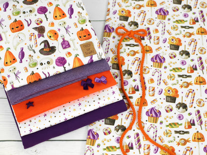 stoff-jersey-baumwolle-baumwolljersey-herbst-halloween-suesses-saures-trick-treat-kuerbis-bunt-serie