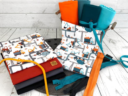 stoff-jersey-baumwolle-baumwolljersey-kathi-kunterbunt-baustelle-bagger-regenbogen-aqua-petrol-senf-serie