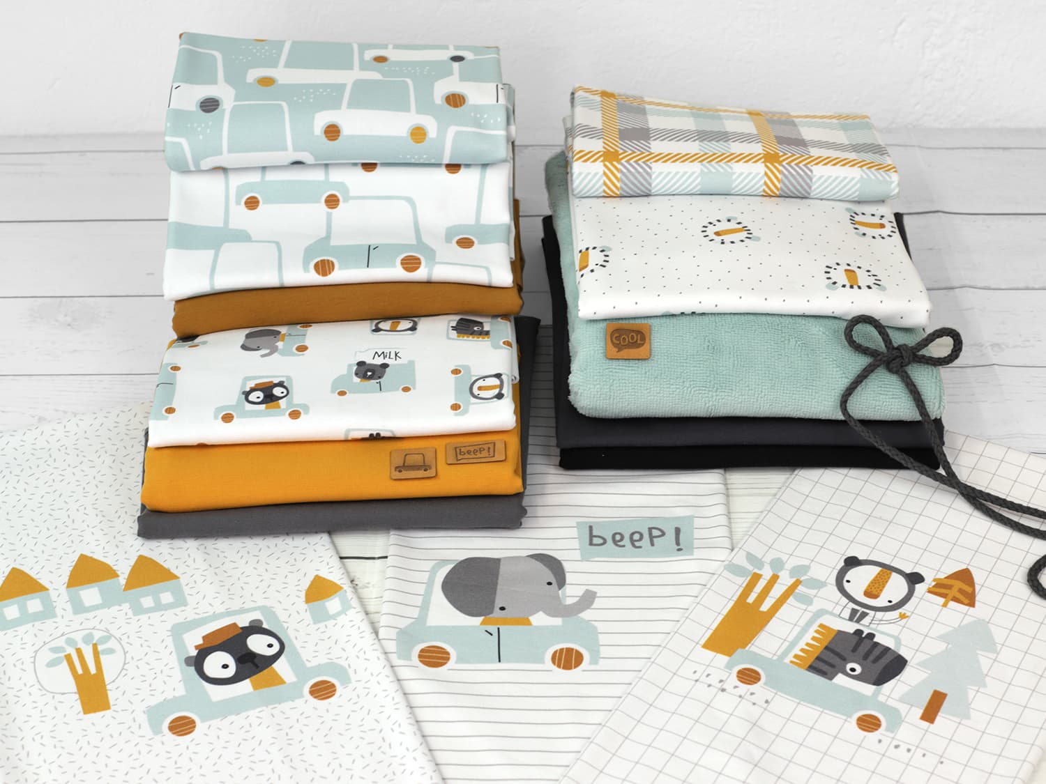 stoff-jersey-baumwolle-baumwolljersey-kathi-kunterbunt-beep-auto-baby-tiere-baer-elefant-tiger-zebra-serie-mint-senf-ocker-weiss