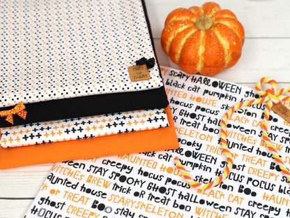 stoff-jersey-baumwolle-baumwolljersey-kathi-kunterbunt-herbst-halloween-woerter-schwarz-orange-serie