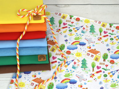 stoff-jersey-baumwolle-baumwolljersey-kathi-kunterbunt-kinderzeichnung-kritzel-sonne-regenbogen-haus-baum-rakete-schmetterling-bunt-schule-verschiedene-farben-serie-4-kleine-kuenst