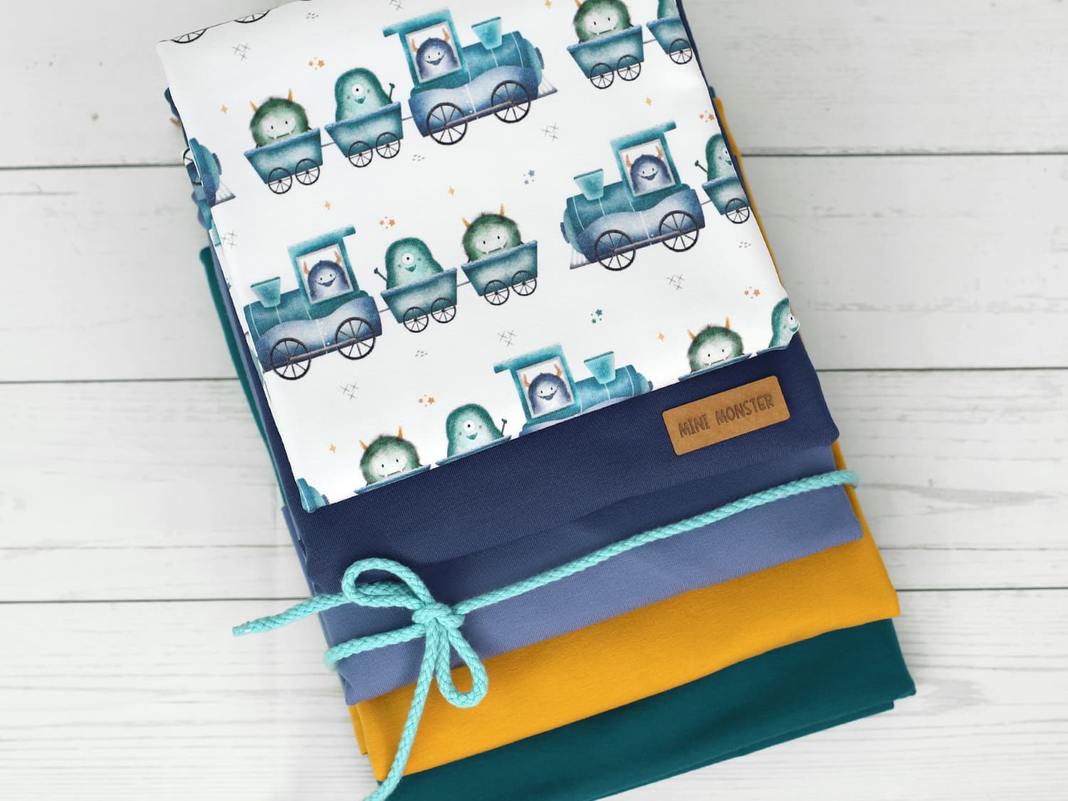 stoff-jersey-baumwolle-baumwolljersey-kathi-kunterbunt-monster-eisenbahn-blau-aqua-3