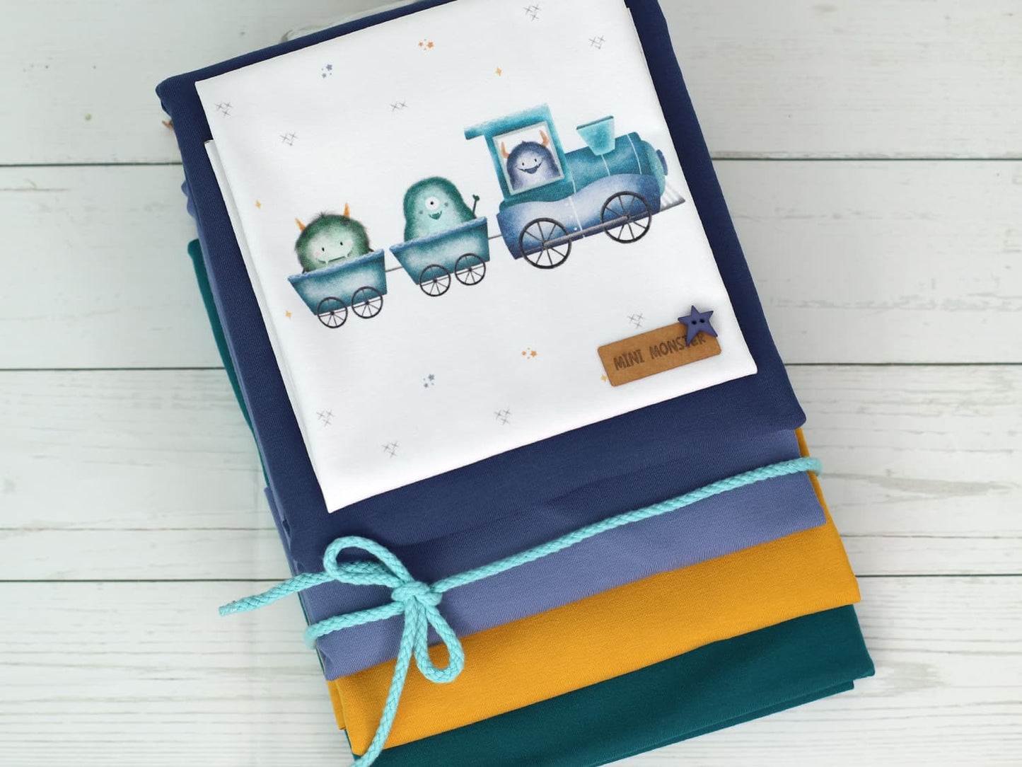 stoff-jersey-baumwolle-baumwolljersey-kathi-kunterbunt-monster-eisenbahn-blau-aqua-panel-2