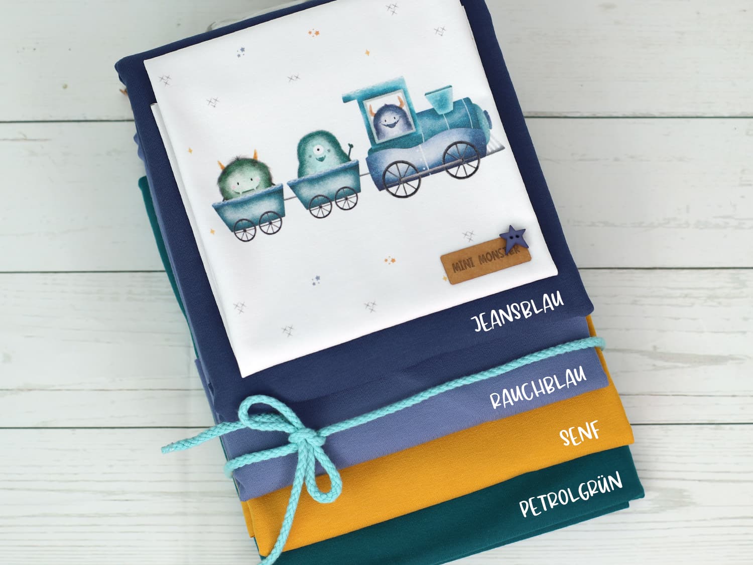 stoff-jersey-baumwolle-baumwolljersey-kathi-kunterbunt-monster-eisenbahn-blau-aqua-panel-kombis