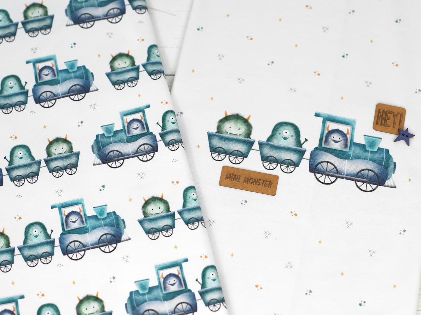 stoff-jersey-baumwolle-baumwolljersey-kathi-kunterbunt-monster-eisenbahn-blau-aqua-serie