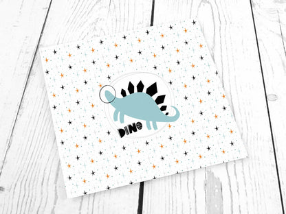 stoff-jersey-baumwolle-baumwolljersey-kathi-kunterbunt-panel-weltall-dinos-dinosaurier-space-stars-roar-planeten-blau