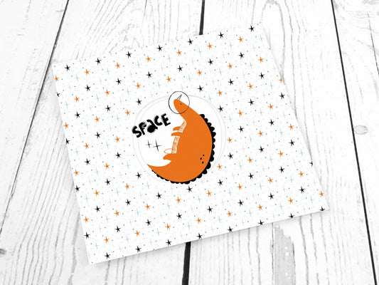 stoff-jersey-baumwolle-baumwolljersey-kathi-kunterbunt-panel-weltall-dinos-dinosaurier-space-stars-roar-planeten-orange