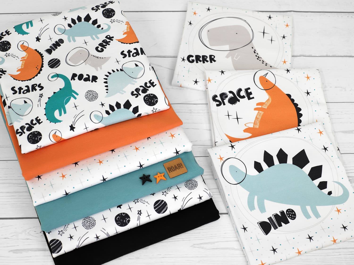 stoff-jersey-baumwolle-baumwolljersey-kathi-kunterbunt-weltall-dinos-dinosaurier-space-stars-roar-planeten-serie