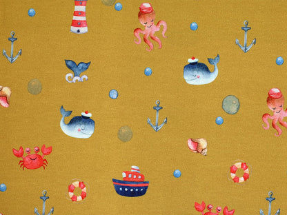 stoff-jersey-baumwolle-baumwolljersey-maritim-nautical-krabbe-anker-wal-leuchtturm-ocker