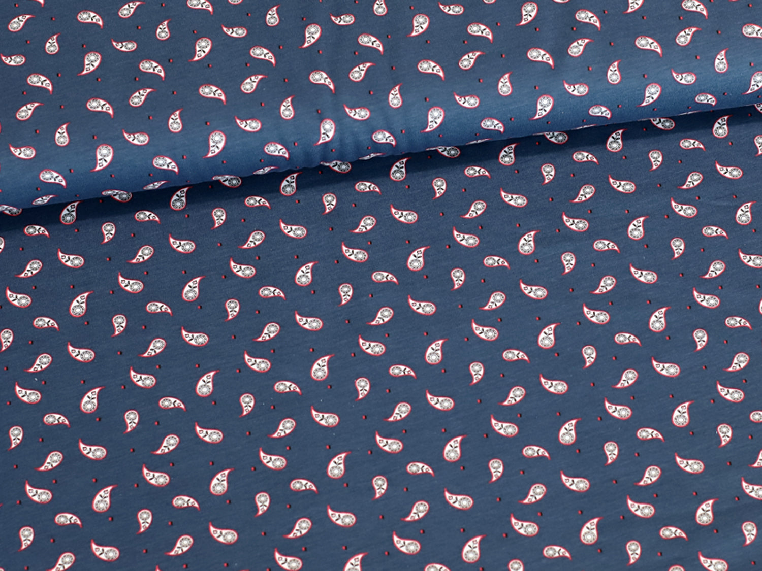 Mini Paisley jersey fabric in jeansblau with a small paisley design, perfect for various sewing projects.