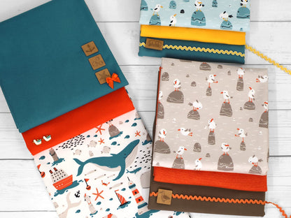 stoff-jersey-baumwolle-baumwolljersey-moewe-wasser-meer-wal-anker-schiff-maritim-serie