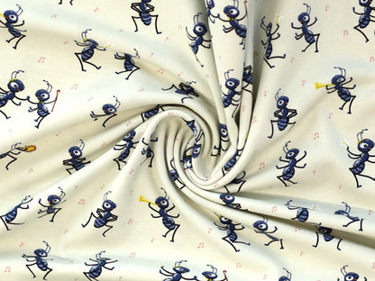 Party ants cotton jersey fabric with playful ants on a cream background, perfect for fun sewing projects.