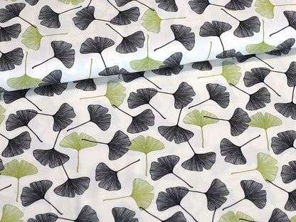 ginkgo cotton jersey fabric featuring beautiful ginkgo leaves on a cream background, ideal for stylish sewing projects.