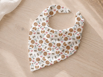 Jersey Stoff Cookies Milk fabric bandana with cookie and milk patterns on a light wooden background.