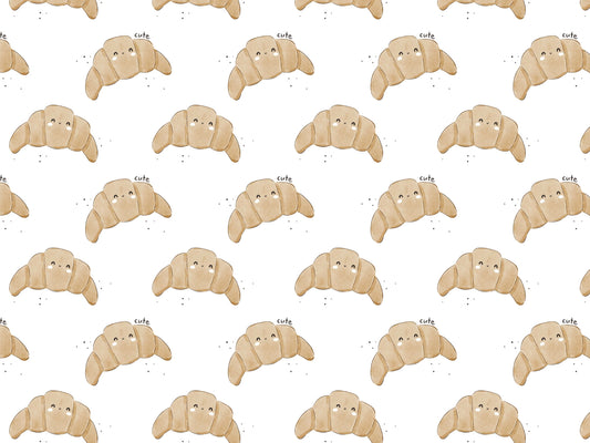 Cute croissant jersey fabric with playful croissant pattern on a light background.