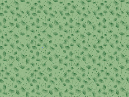 green jersey fabric with dandelion print in a beautiful pattern on a light green background.