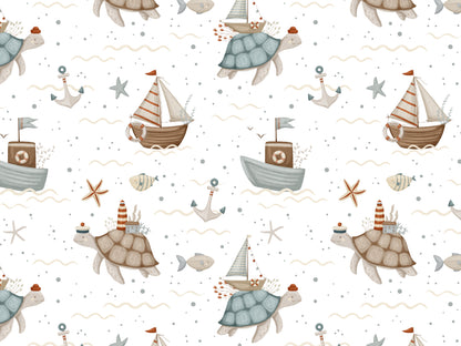 Jersey Stoff Schildkröte Sommer - Muster mit Schildkröten und Segelbooten auf hellem Hintergrund.