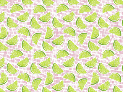 Muster aus Limetten auf rosa Hintergrund, ideal für Jersey Stoff - Limone kaufen.