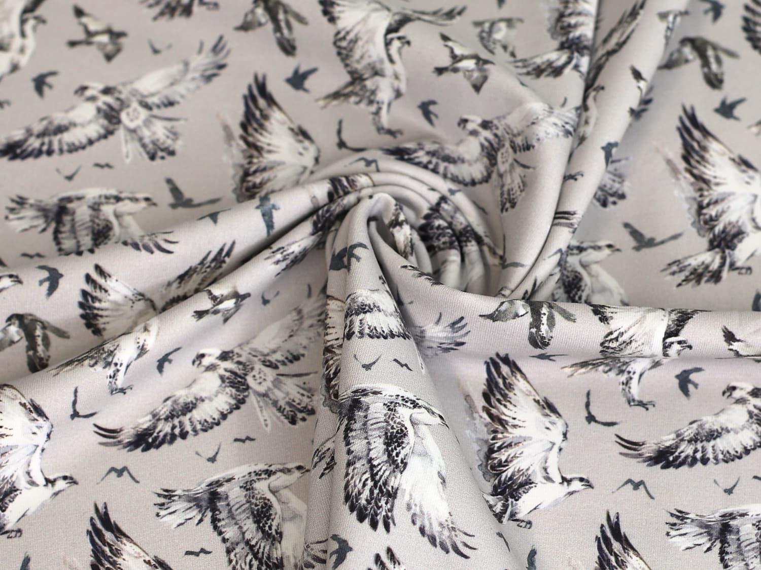 stoff-jersey-baumwolle-baumwolljersey-vogel-adler-grau-beige