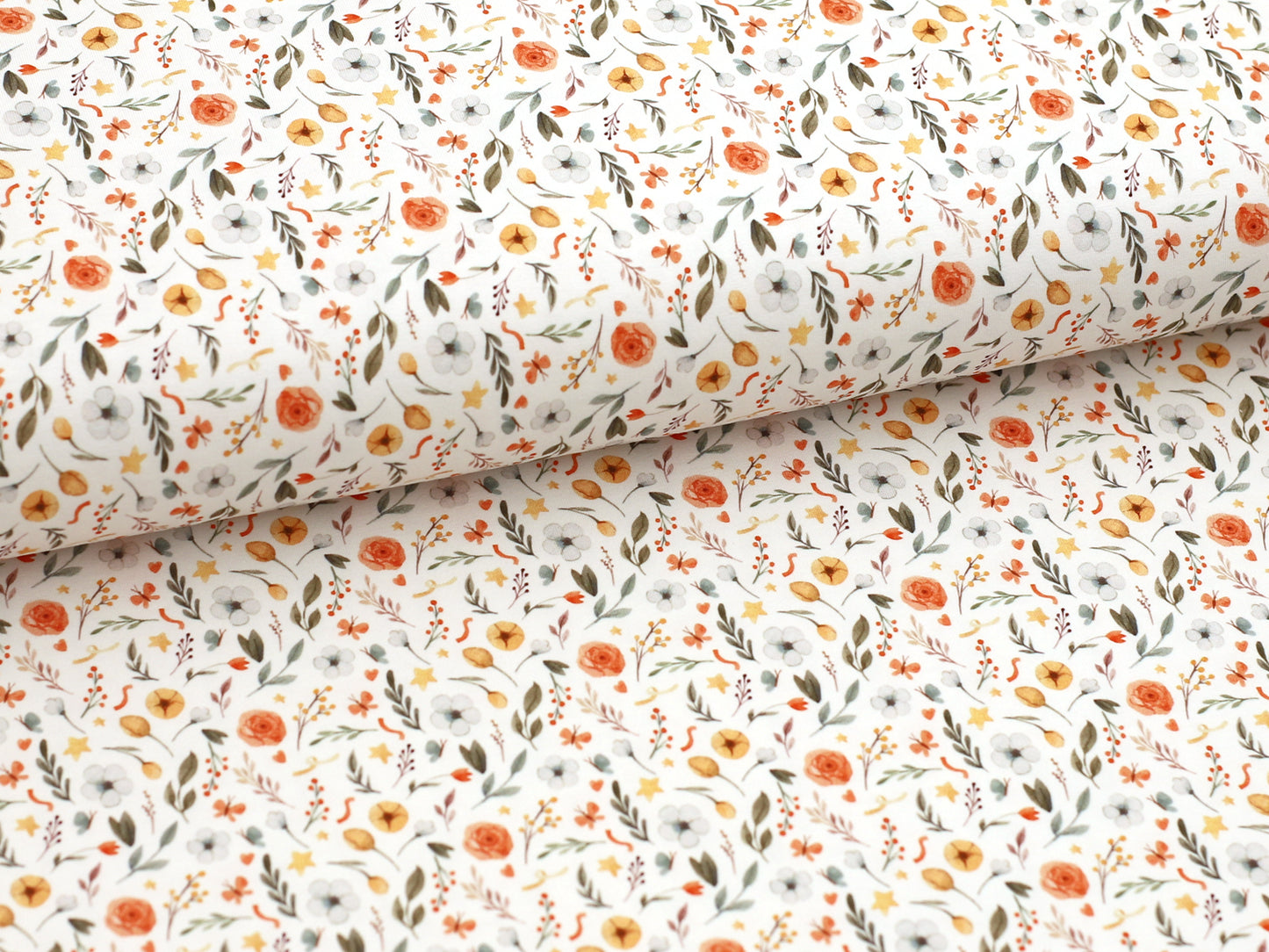 Jersey Stoff Blumenmuster - schöner Baumwolljersey mit floralen Motiven und bunten Blüten auf hellem Hintergrund.