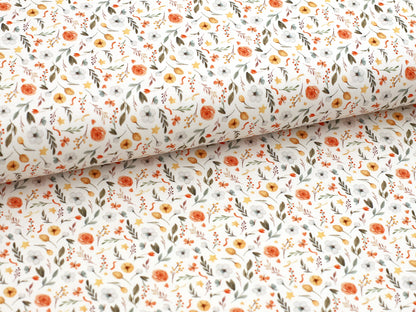 Jersey Stoff Blumenmuster - schöner Baumwolljersey mit floralen Motiven und bunten Blüten auf hellem Hintergrund.