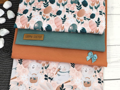 stoff-jersey-baumwolljersey-meterware-hasen-ostern-serie-hasen-picknick-blassapricot