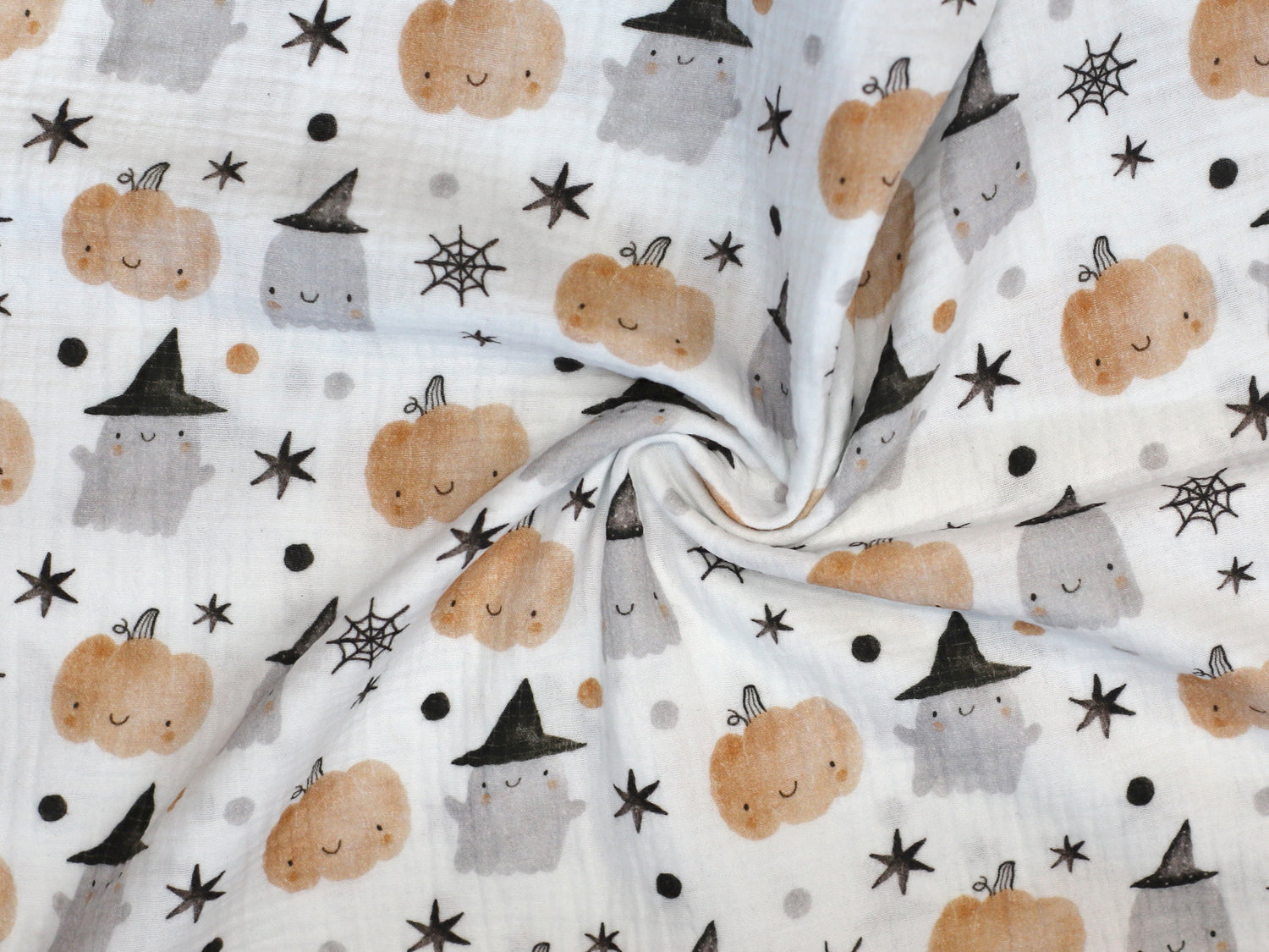 Halloween musselin fabric featuring adorable ghosts, pumpkins, and stars pattern.