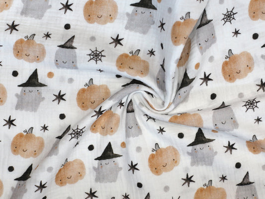 Halloween musselin fabric featuring adorable ghosts, pumpkins, and stars pattern.