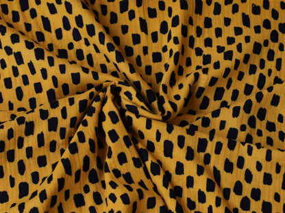 stoff-musselin-double-gauze-meterware-kurze-striche-gelb-schwarz