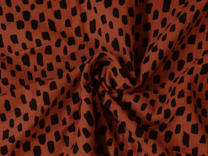 stoff-musselin-double-gauze-meterware-kurze-striche-rostrot-schwarz