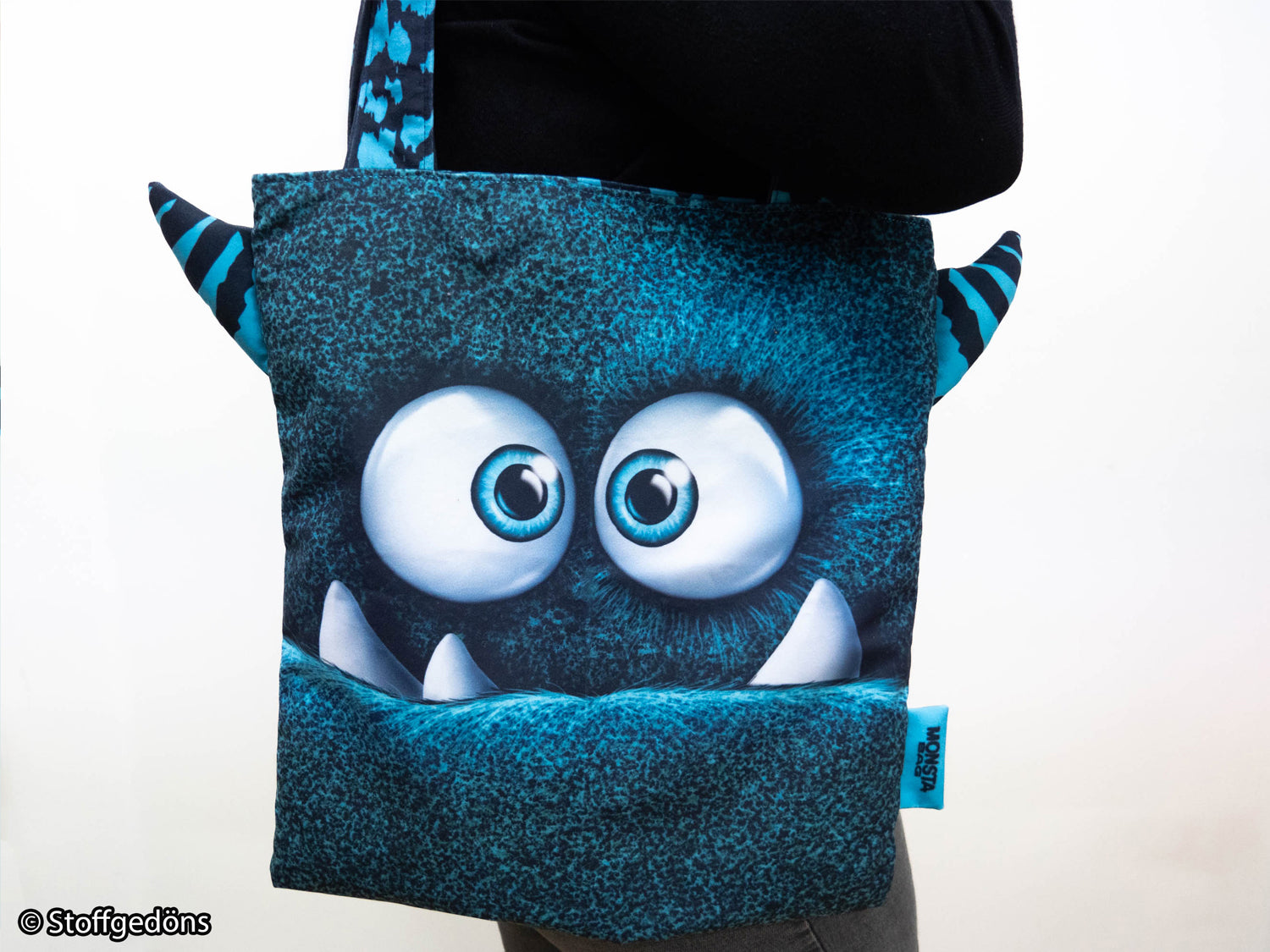 Samt PANEL - Thorsten Berger - MONSTA BAG, petrol featuring a playful monster design and vibrant colors.
