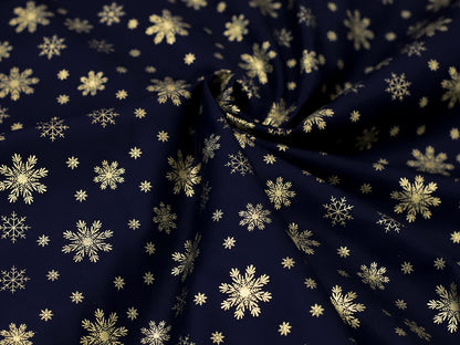 stoff-weihnachten-baumwolle-webware-schnee-schneeflocken-gold-auf-marine-dunkelblau-2