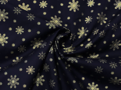 stoff-weihnachten-baumwolle-webware-schnee-schneeflocken-gold-auf-marine-dunkelblau