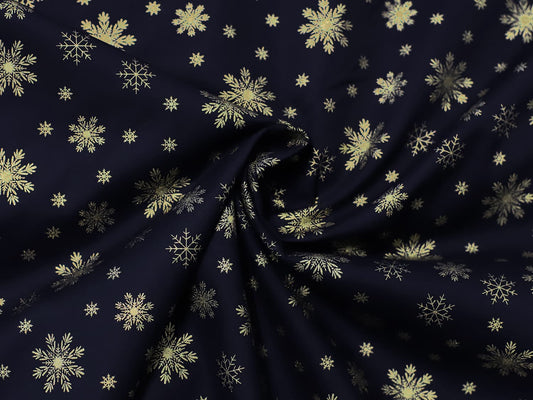 stoff-weihnachten-baumwolle-webware-schnee-schneeflocken-gold-auf-marine-dunkelblau