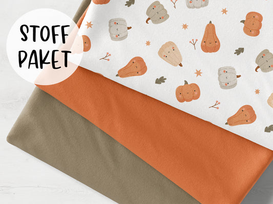 Stoffpaket - Lächelnde Kürbisse - schlamm, mit Jersey Stoffen in orange und schlamm für kreative Nähprojekte.