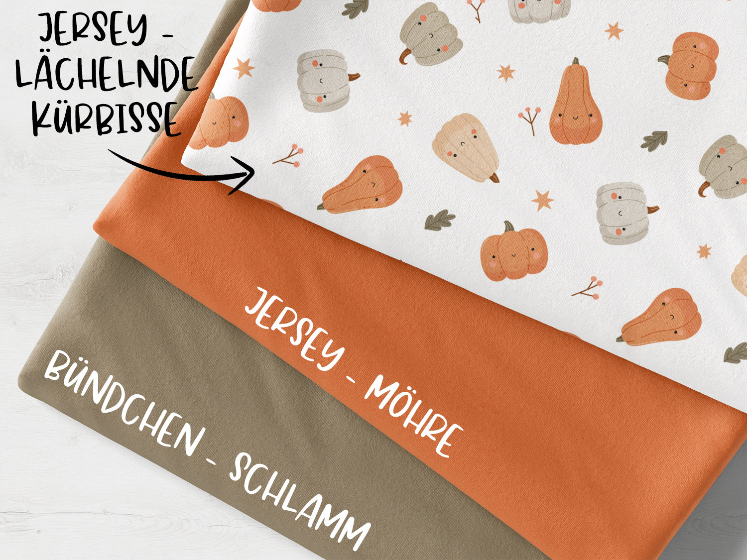 Stoffpaket - Lächelnde Kürbisse - schlamm mit bunten Jersey-Stoffen und Bündchen in schlammfarben.
